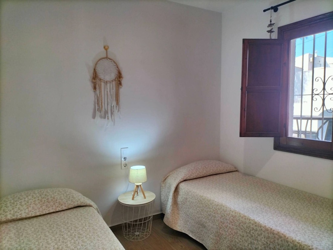 Segundo dormitorio con dos camas individuales